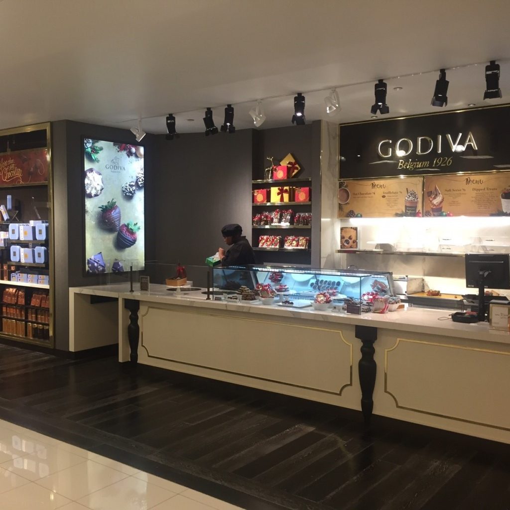 Godiva shop located within Macy's